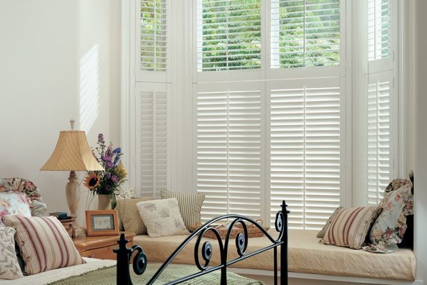 Window Treatments for Bay Windows: Heritance® hardwood shutters